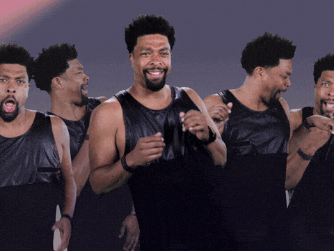 DeRay Davis is dancing with a bunch of clones. The caption is "partying w/ the people I love".