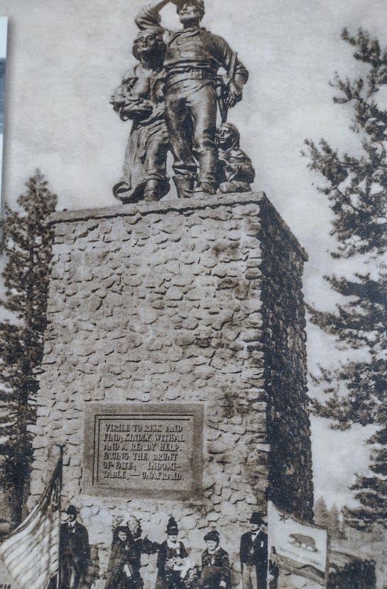 Same statue as in previous picture, with people, 1918