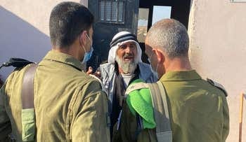Israeli military commanders Yehuda Fuchs and Avihay Zafrani during a visit to Khirbet al-Mufkara, Saturday.