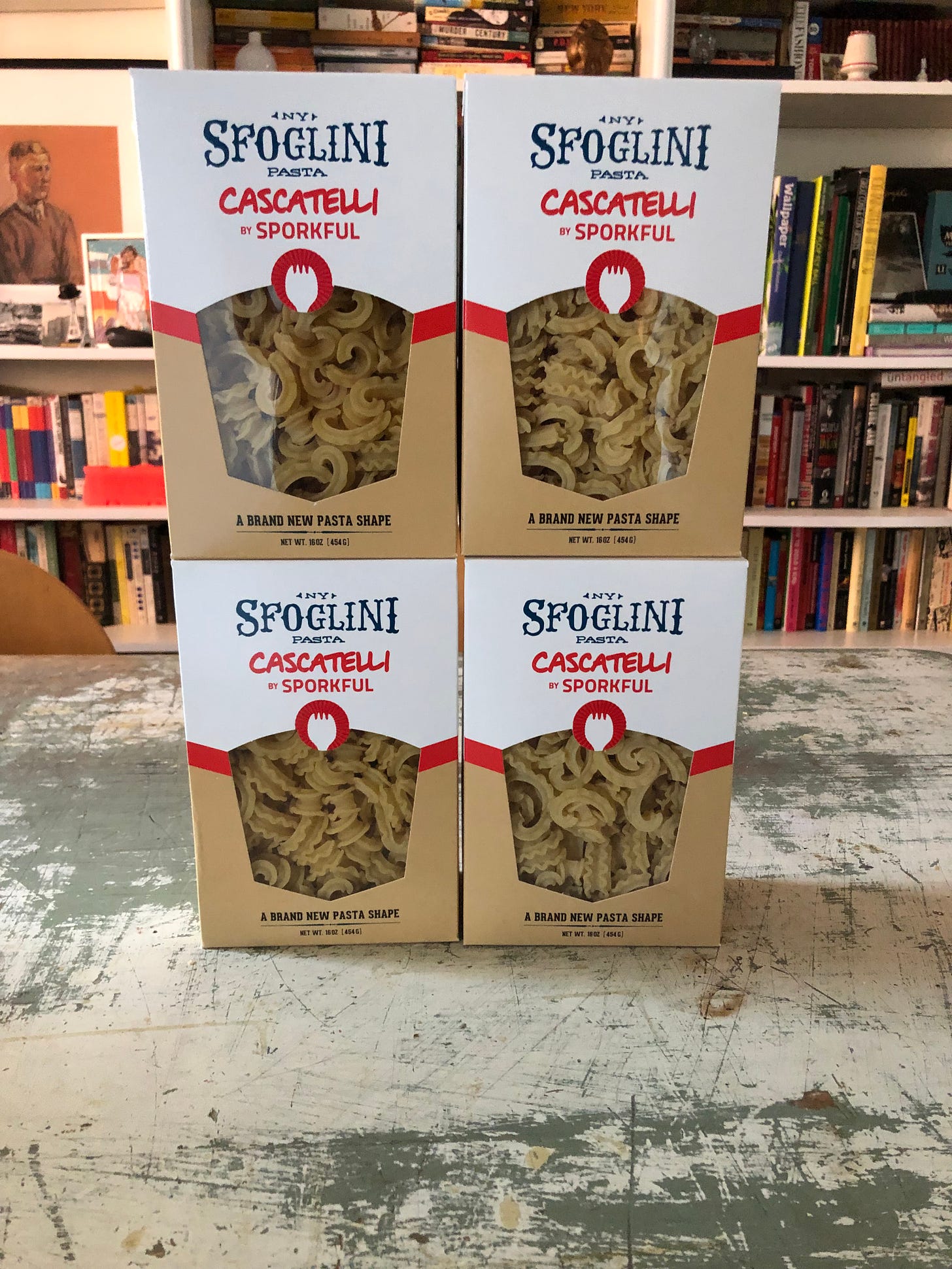 Four boxes of pasta. The boxes read Sfoglini Pasta. Cascatelli by Sporkful. A brand new pasta shape.