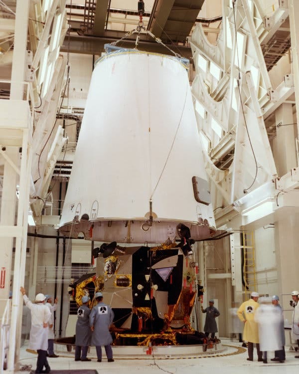 The third stage adapter being lowered into place over the lunar module of the Apollo 13 mission. The lunar module served as a “lifeboat” for the astronauts after the explosion on the service module.