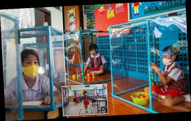 Thai pupils sealed in perspex boxes in fight against ...