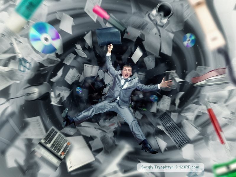 scared businessman is falling into office chaos