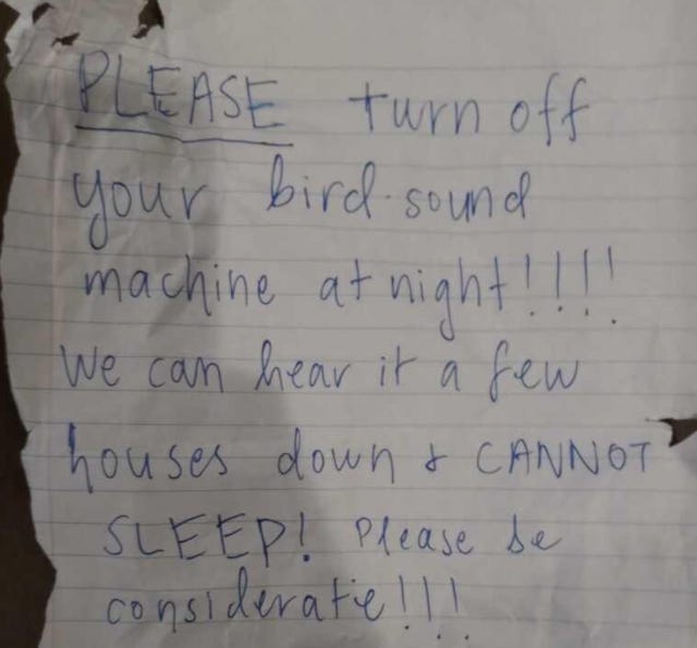 a handwritten note that reads: PLEASE turn off your bird sound machine at night!!!! we can hear it a few houses down and CANNOT SLEEP! please be considerate!!!