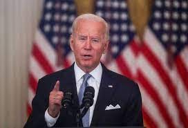 Biden Afghanistan policy counts on war weary Americans to lose interest |  Reuters