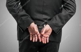 Handcuffed businessman Stock Photo by ©minervastock 54351537