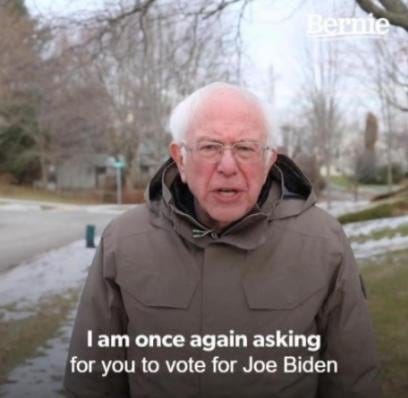 Image may contain: 1 person, outdoor, text that says 'Bernie Iam once again asking for you to vote for Joe Biden'