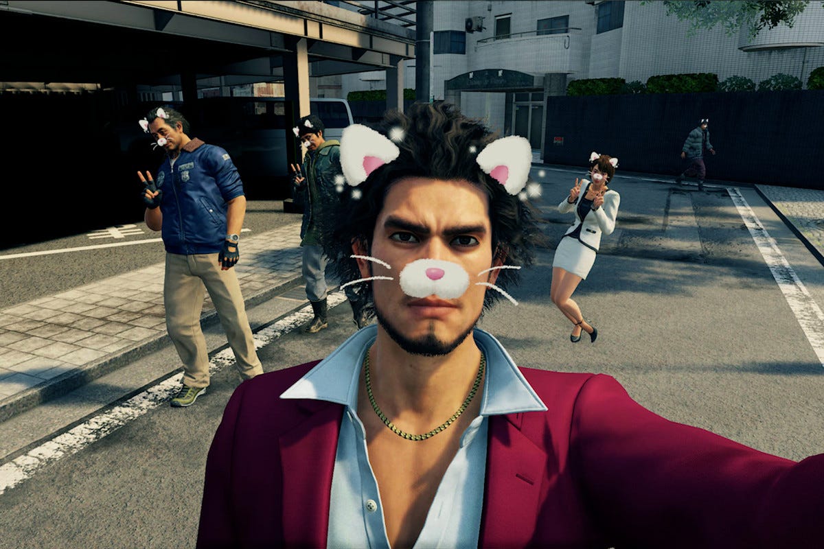 The friends in Yakuza: Like a Dragon pose for a selfie.