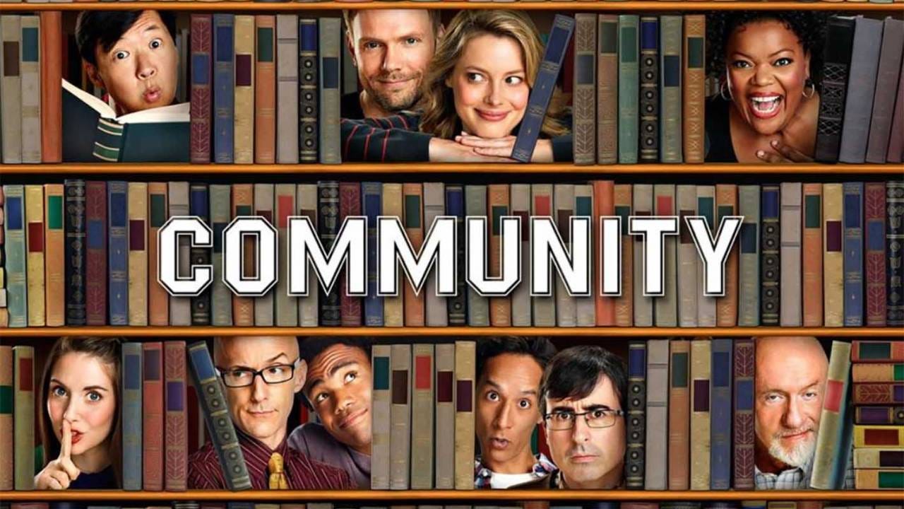 Community sitcom poster with the ensemble cast peeking out of a bookshelf.