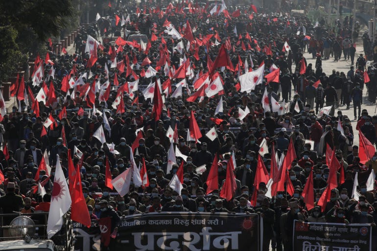 Protesters in Nepal take part in a rally against the dissolution of Parliament, in Kathmandu [Navesh Chitrakar/Reuters]