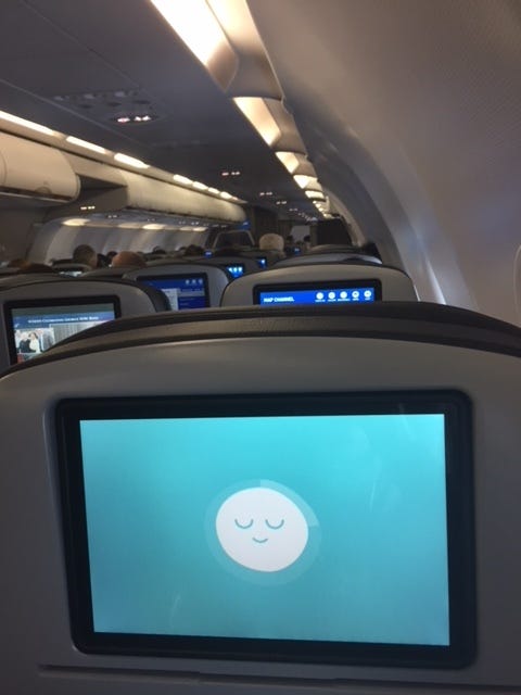 On one of my flights I discovered the magic of listening to a Headspace meditation. Highly recommend.
