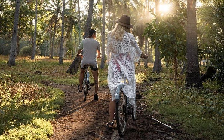 Logan and Tyler bike riding in Bali