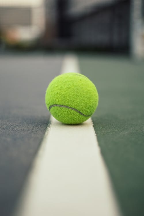 Free Green Tennis Ball on Court Stock Photo