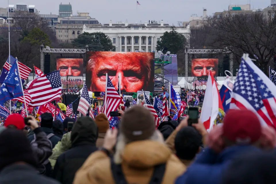 Trump supporters participate in a rally in Washington on Janury 6, 2021.  (John Minchillo/AP)