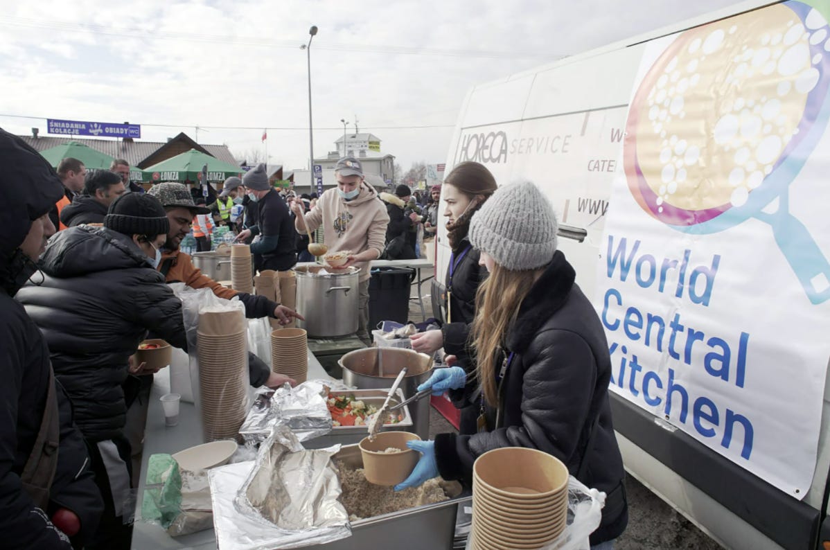 World Central Kitchen volunteers serve hot meals of chicken, rice and vegetables at the border of Ukraine and Poland on Sunday. (World Central Kitchen) - The FoodTech Confidential Newsletter