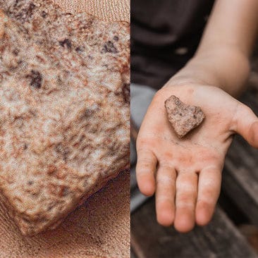 close up and pan of heart-shaped rock