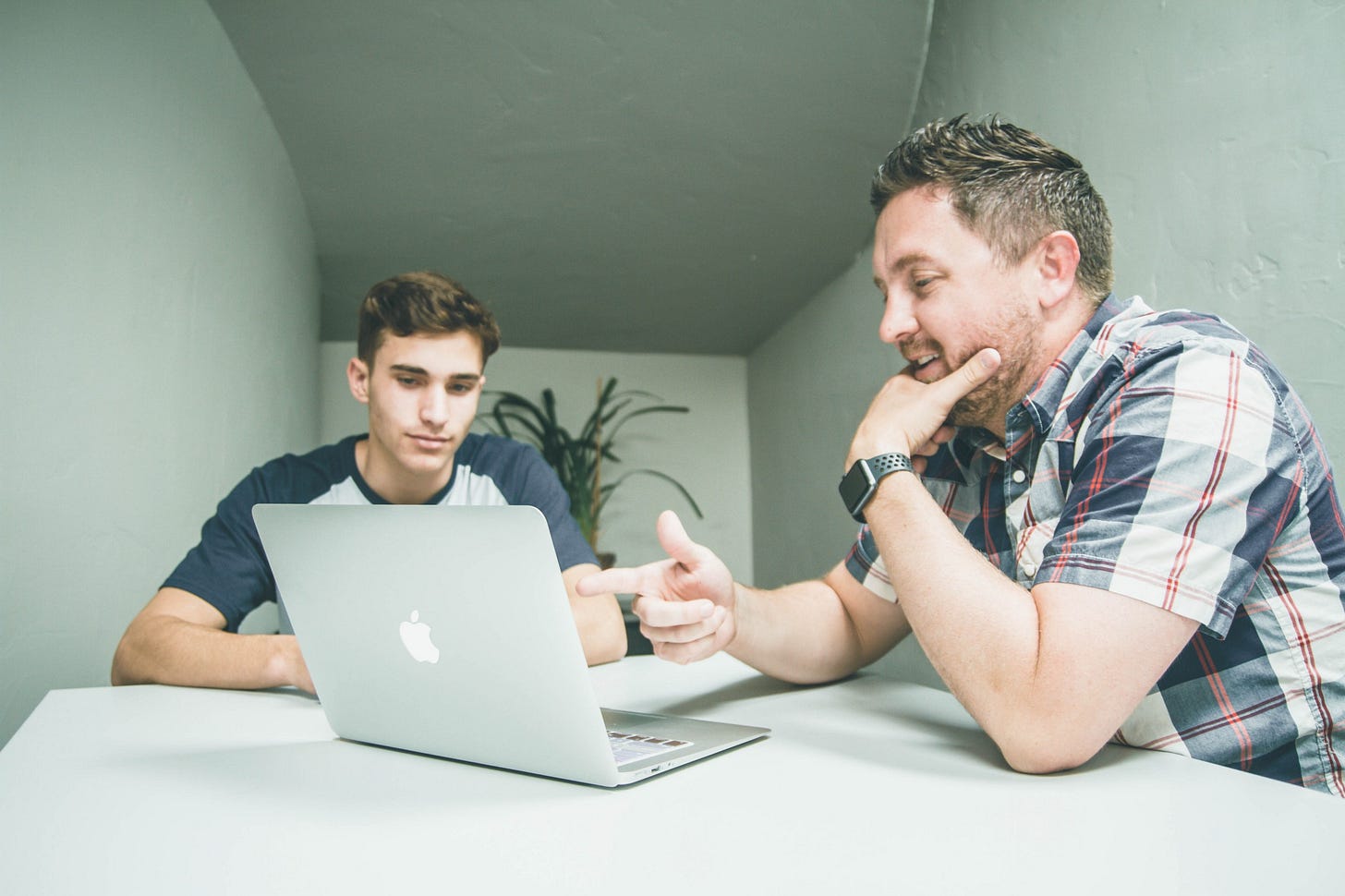 Image of a mentor and his student for article by Larry G. Maguire