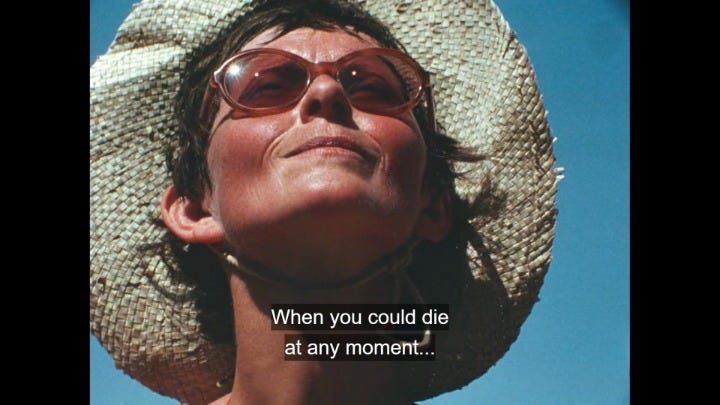 Screencap from Fire of Love, a documentary on two volcanologists whose lives revolved around each other and their work. Here, the closed captions read "When you could die at any moment", because their work had constant perils.