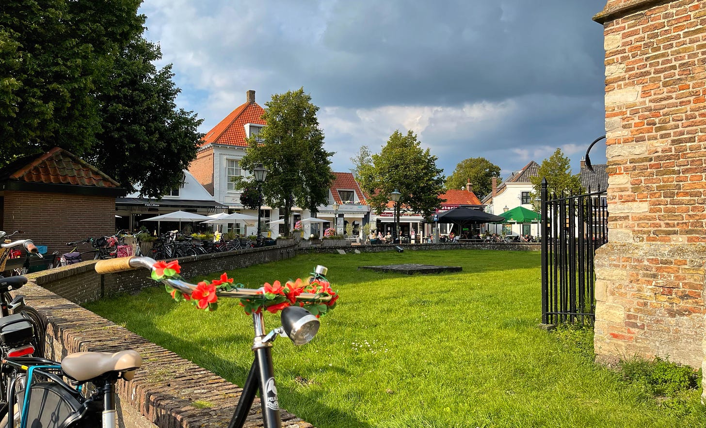 bicycle in front of church in Burgh-Haamstede, Zeeland, photo Alexander Verbeek