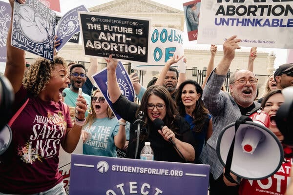 Anti-abortion activists celebrating at the Supreme Court.