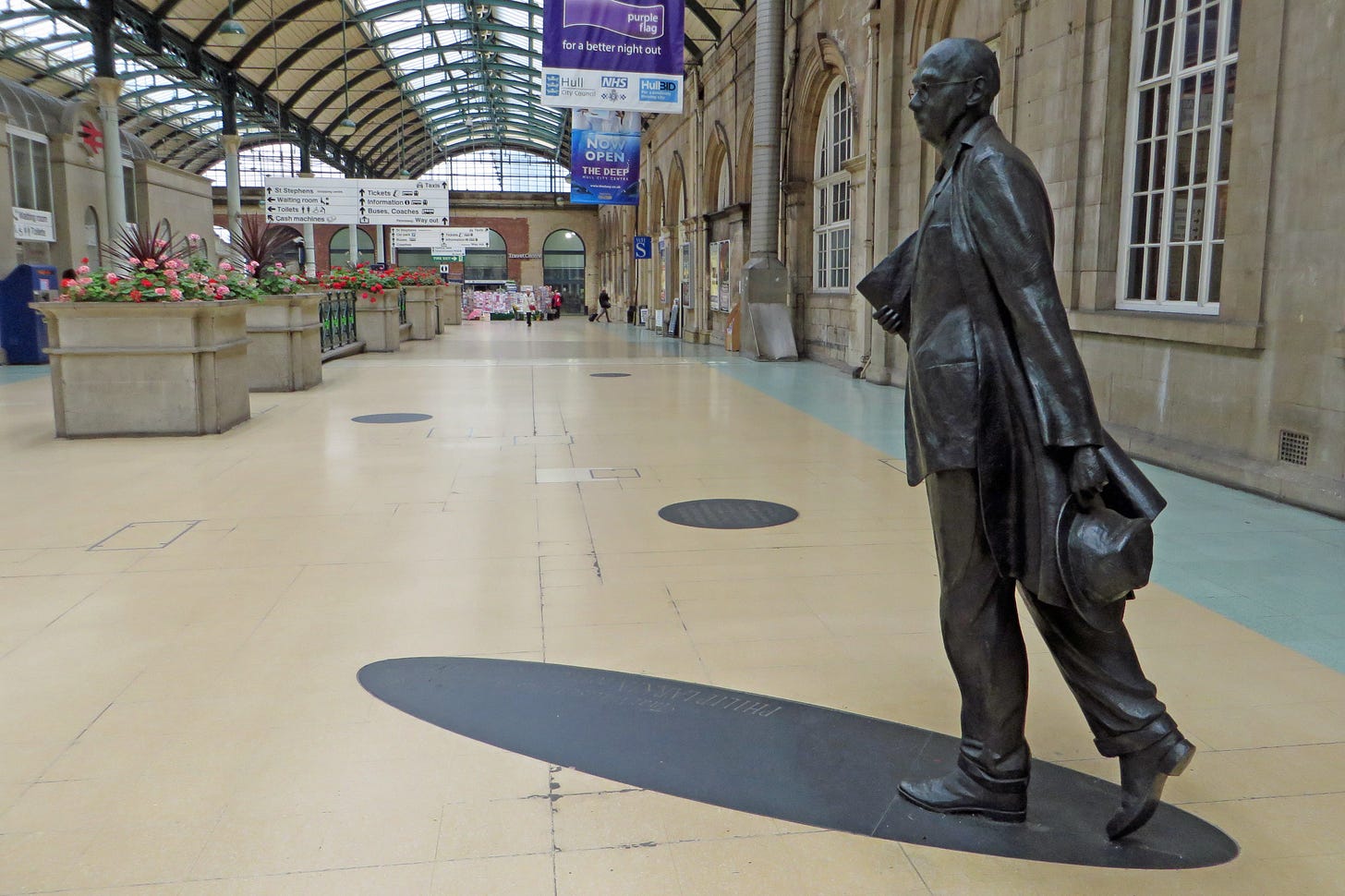 The Philip Larkin statue at Hull train station depicting him walking slowly with his hat in his hand The Philip Larkin statue at Hull train station depicting him walking slowly with his hat in his hand
