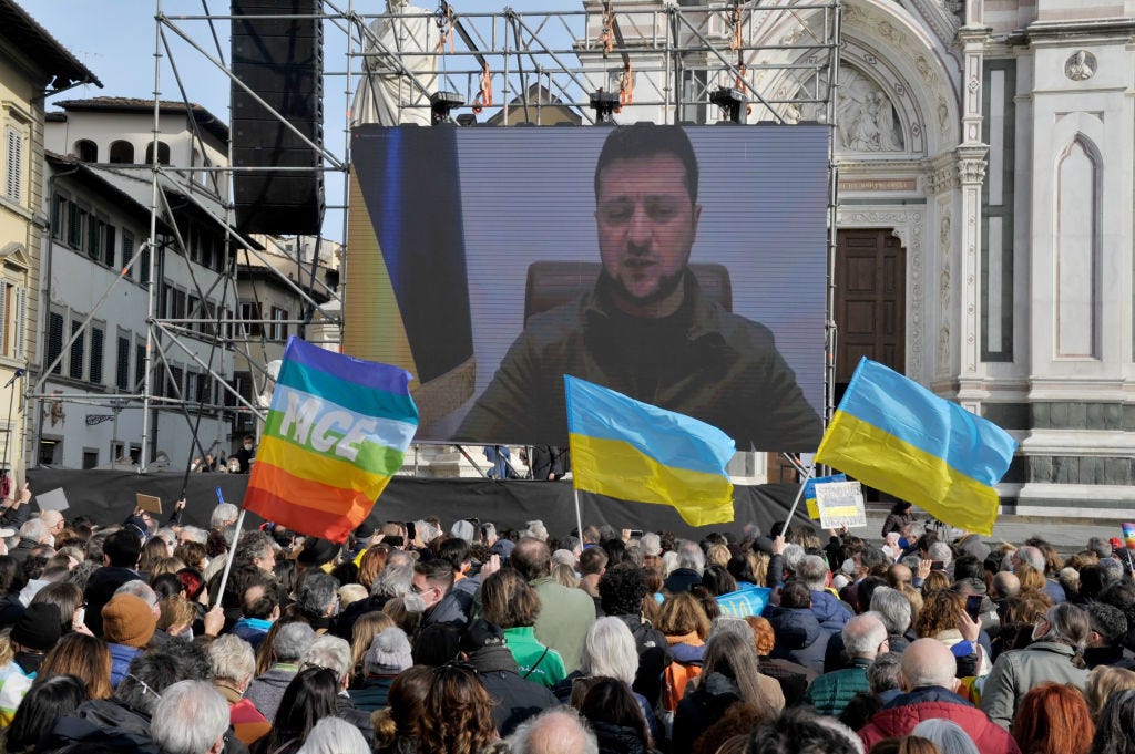 Ukrainian President Volodymyr Zelensky speaks via a live video link during an anti-war demonstration Saturday in Florence, Italy. (Laura Lezza / Getty Images)