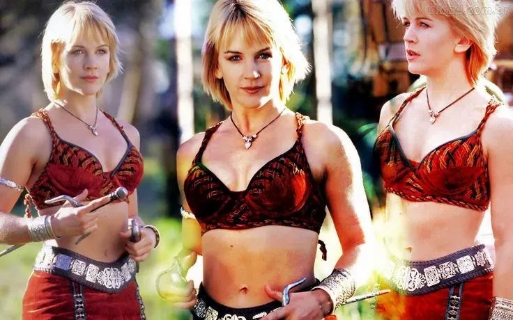 A tryptic shows the character of Gabielle in three poses, all dressed in her late-series red leather bikini and bare, muscled midriff. She has short blonde hair and is carrying a pair of sai.