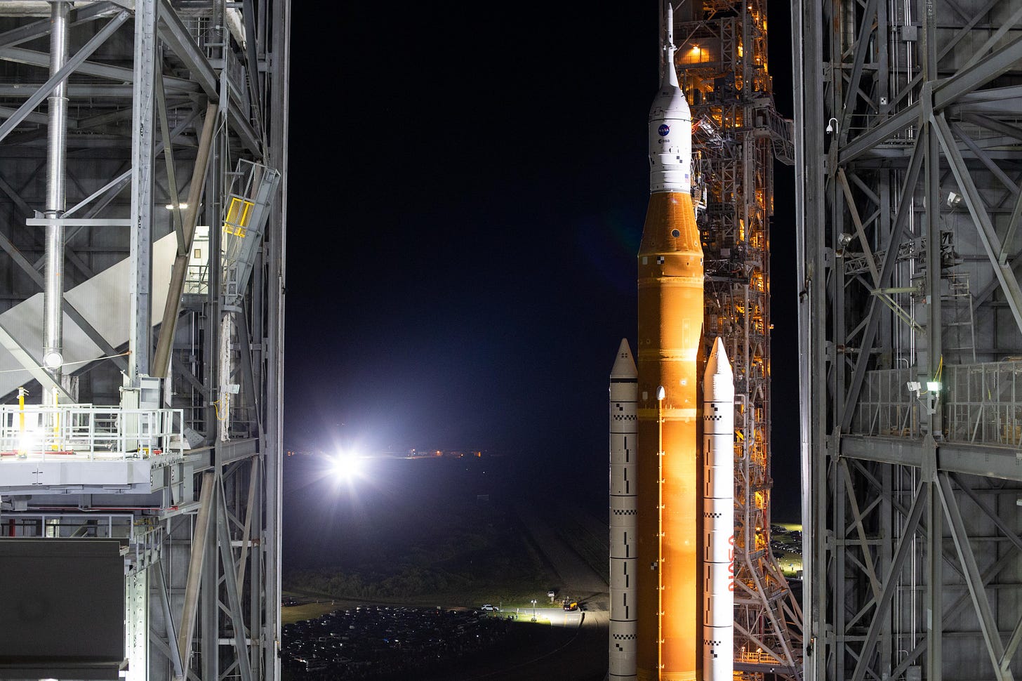 NASA’s Space Launch System (SLS) rocket with the Orion spacecraft aboard is seen atop a mobile launcher as it rolls out of the Vehicle Assembly Building to Launch Pad 39B, Tuesday, Aug. 16, 2022, at NASA’s Kennedy Space Center in Florida.