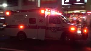New York University ambulance responding with siren and lights - YouTube