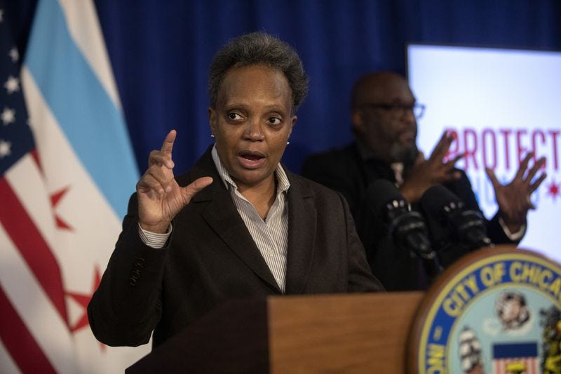 Chicago Mayor Lori Lightfoot announces new proof-of-vaccination requirements for the city during a news conference at City Hall on Dec. 21, 2021, in Chicago.