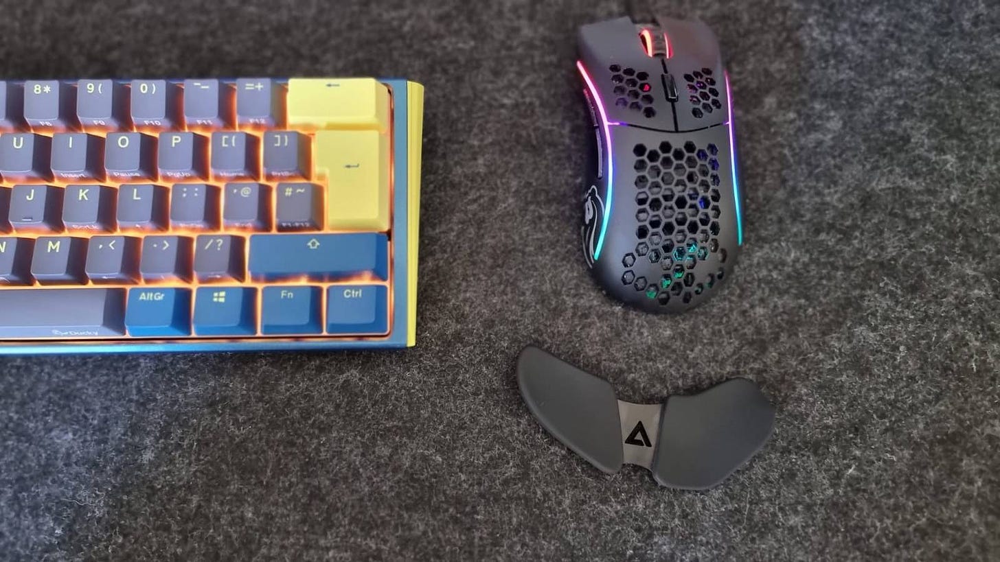 Carpio 2.0 next to a mouse and keyboard