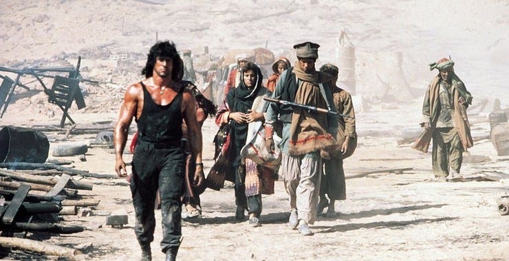 Screen Grab of Rambo III looking badass with the Afghan Mujahideen.