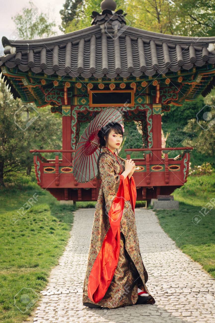 Beautiful Asian Woman Walking In The Garden And Wearing Traditional Japanese  Kimono And Red Umbrella Stock Photo, Picture And Royalty Free Image. Image  42995392.