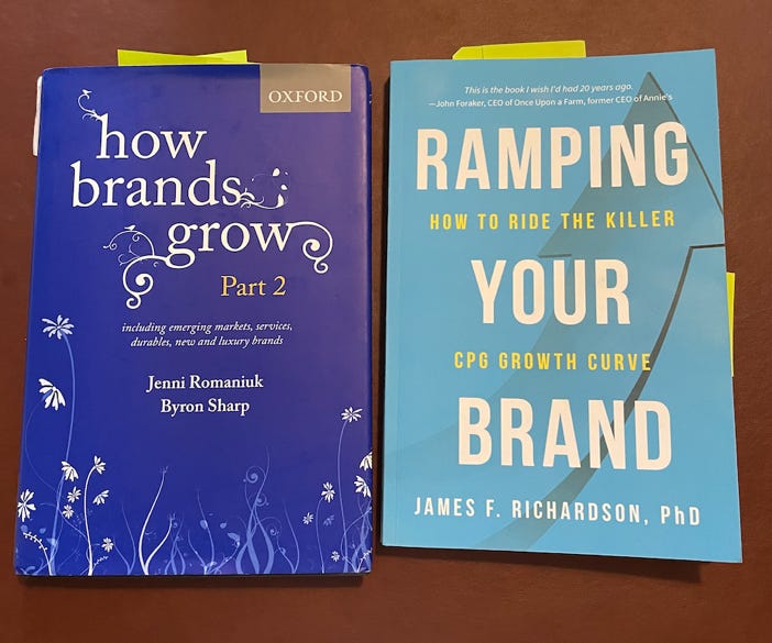 How Brands Grow by Jenni Romaniuk and Byron Sharp , Ramping Your Brand by Dr. James Richardson comparing marketing methodologies for food business startups