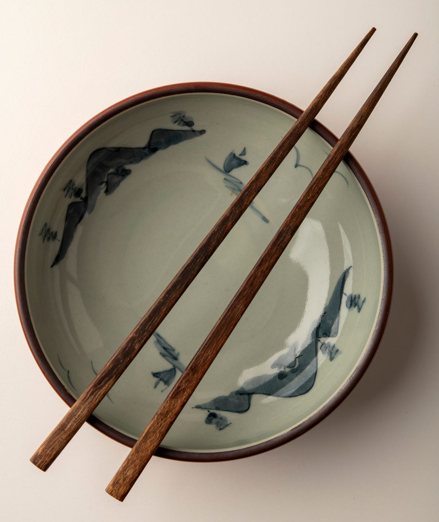 Empty bowl with chopsticks