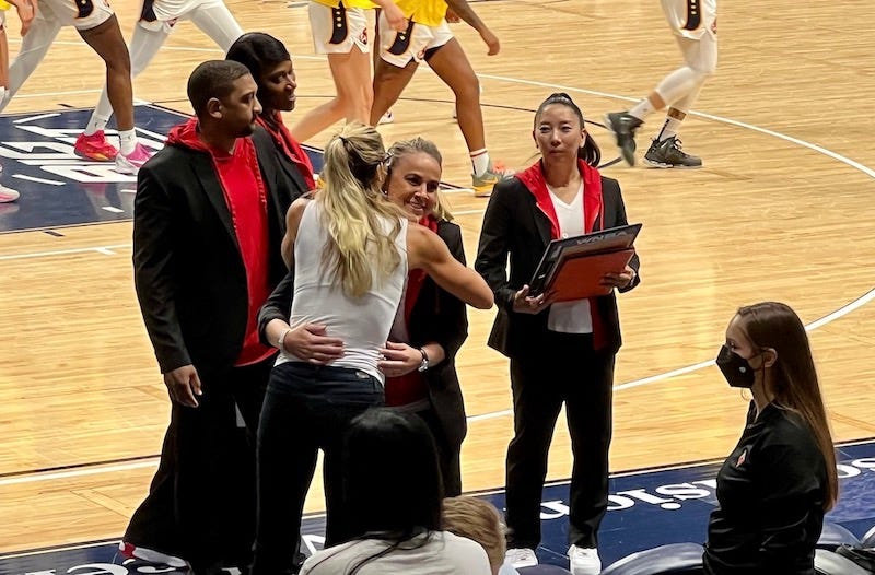 Jenny Boucek gives Becky Hammon a big hug before the Las Vegas Aces played the Indiana Fever on Sunday afternoon.