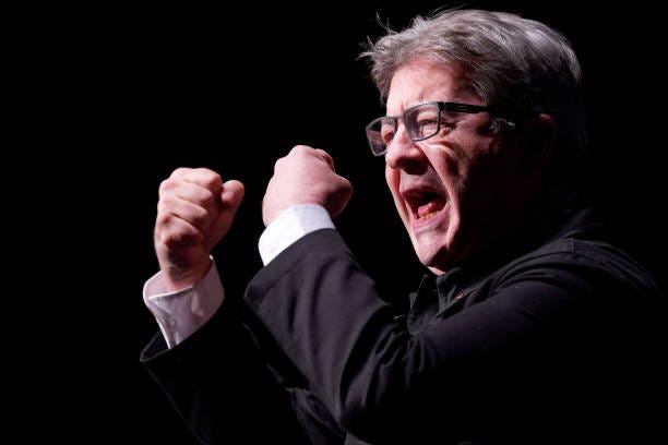French leftist La France Insoumise party leader and member of parliament, Jean-Luc Melenchon gestures as he delivers a speech during La France...