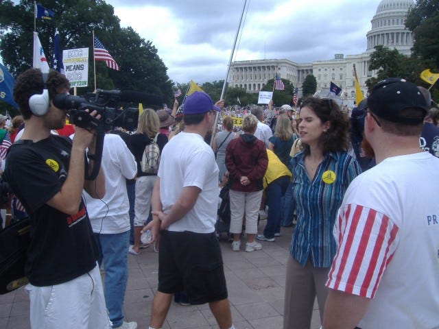 This woman was interviewing people for a later video and her company was called 'Hi There Productions'.