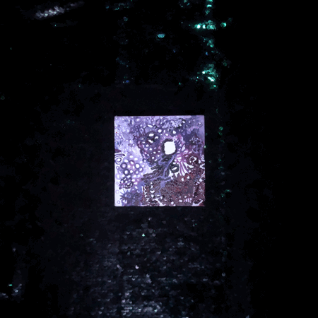 An animated loop of a small square painting hopping in a spiral on top of a black sequin background, then snapping in reverse order under a blacklight. 
