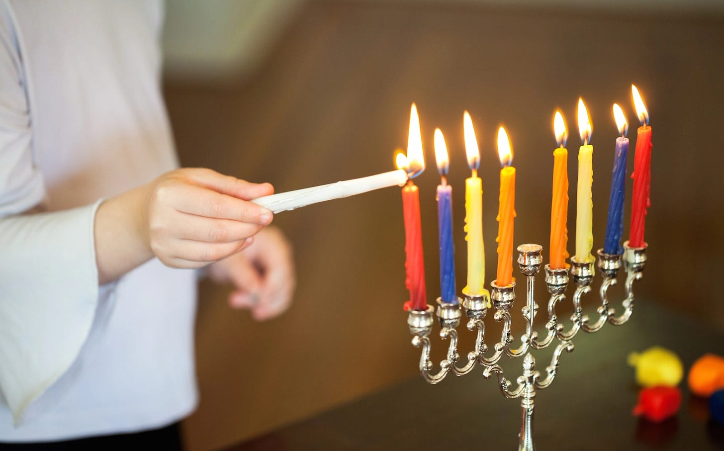 A menorah lit up for night eight of Hanukkah.