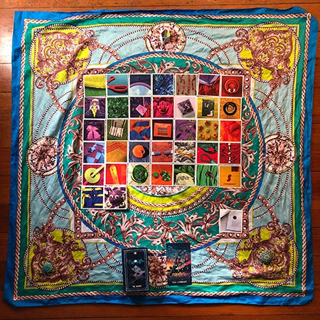 37+ cards laid in a grid on a colorful silk scarf. Rainbow Squared cards with images from Year 2. This is the spread for this week’s reading, piece thirty-seven of Rainbow Squared Year 5. Each card is laid out in the order that I drew them this year. 