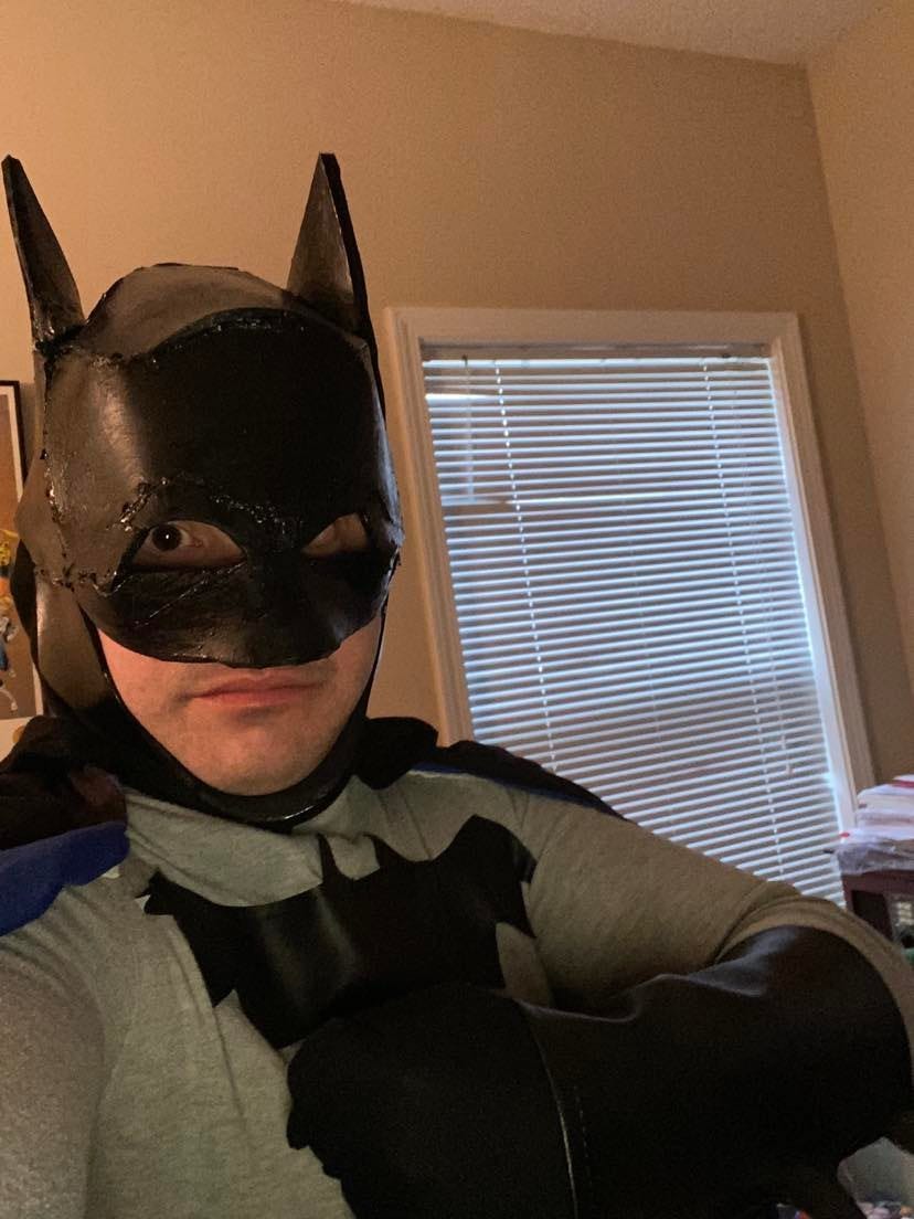 Author dressed in homemade Batman costume, black and gray.