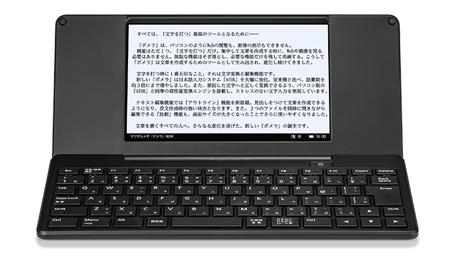 A foldable e-ink tablet with keyboard. the screen is glowing and there is text on it.