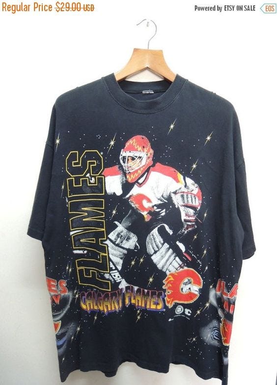 #Vintage 90's Calgary Flames Ice Hockey T Shirt Sport Street Wear Swag Hip Hop Top Tee Punk Rock Surf  Measurement : Armpit to armpit = 25" Shoulder to end of garment = 31" ... #retro #sale #vintage #preloved #preused #shirts #t-shirts #nhl #adidas #champion