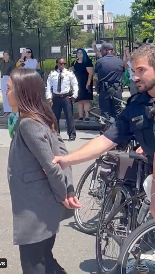 AOC mocked for 'pretending to be handcuffed' while being arrested by  Capitol Police during abortion rights protest