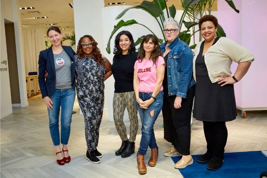 Margit and 5 other women from last week's event posing and smiling for camera