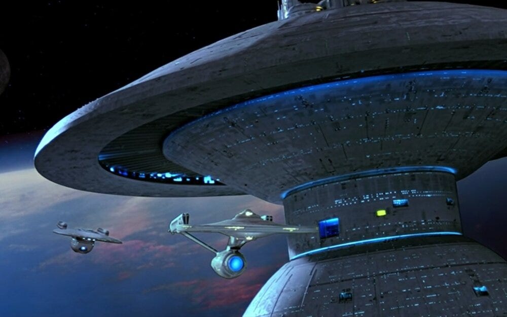 This image from 1984's feature film Star Trek III: The Search for Spock shows the U.S.S. Enterprise (NCC-1701) fleeing the U.S.S. Excelsior (NX-2000) after being stolen from Starfleet's orbital Spacedock station. This image from 1984's feature film Star Trek III: The Search for Spock shows the U.S.S. Enterprise (NCC-1701) fleeing the U.S.S. Excelsior (NX-2000) after being stolen from Starfleet's orbital Spacedock station.