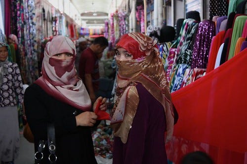 Uyghur women shopping in the bazar, Kashgar, Xinjiang