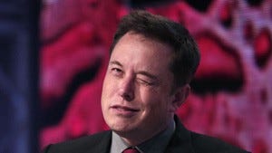A photo of Elon Musk winking.