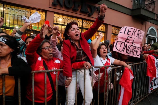 Demonstrators celebrating after President Martín Vizcarra dissolved the legislature in Lima, Peru, on Monday.